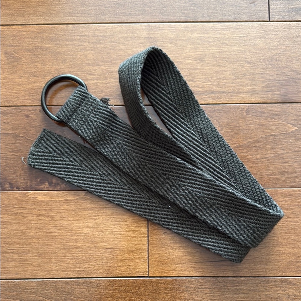 Dark olive in color. Textured Belt with Ring Buckle